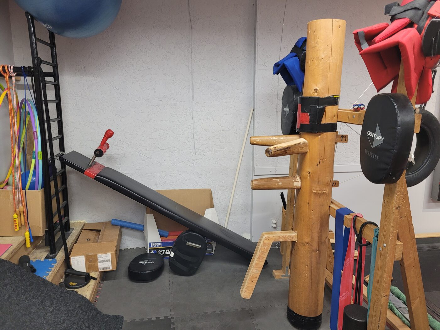 Gym area with sit-up bench